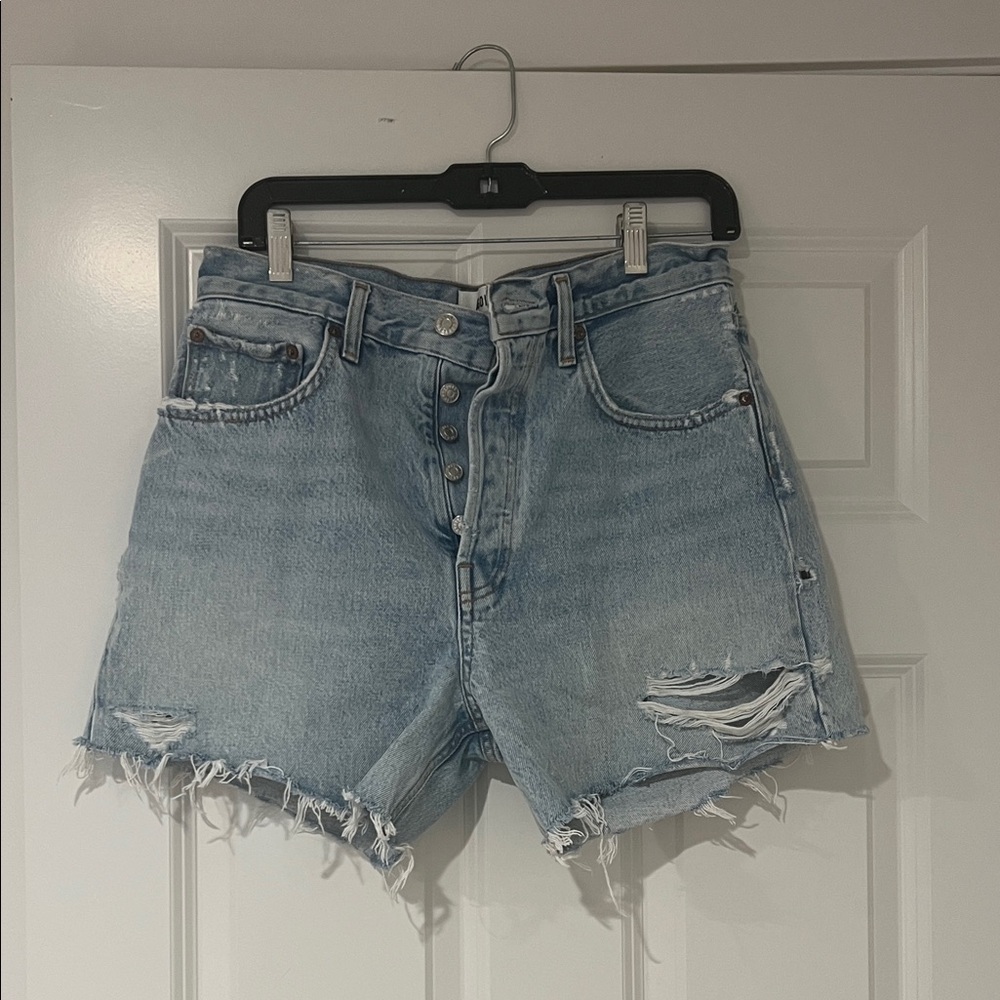 Agolde Riley Shorts. Light Blue Distressed Jean Shorts